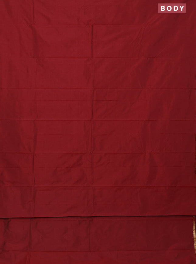 Arani semi silk saree maroon shade with plain body and small zari woven border