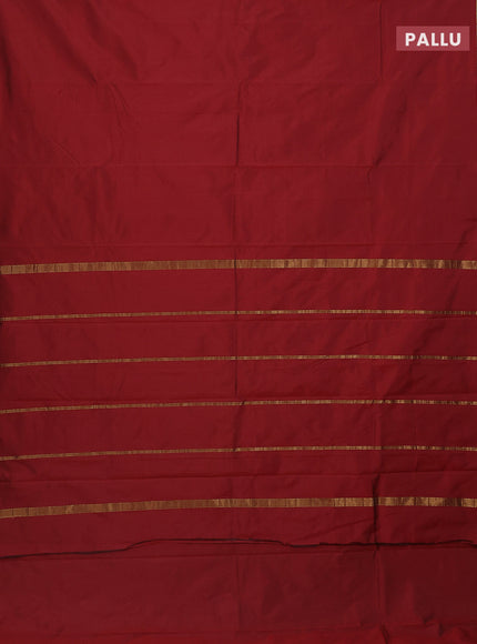 Arani semi silk saree maroon shade with plain body and small zari woven border