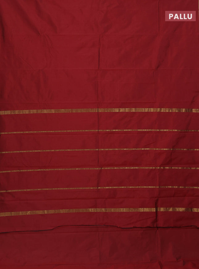 Arani semi silk saree maroon shade with plain body and small zari woven border