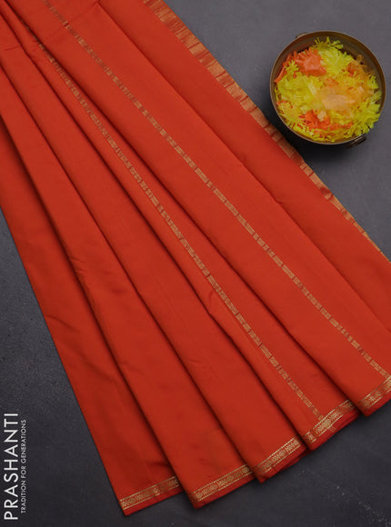 Arani semi silk saree orange with plain body and small zari woven border
