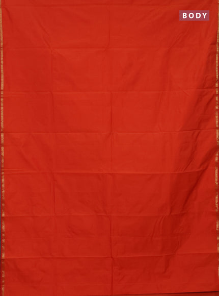 Arani semi silk saree orange with plain body and small zari woven border
