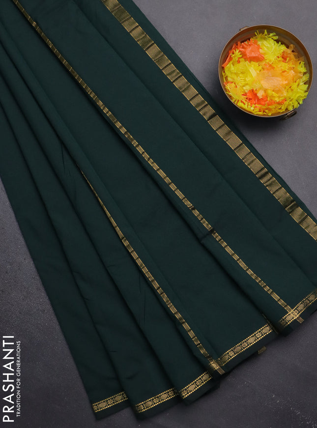 Arani semi silk saree bottle green with plain body and small zari woven border