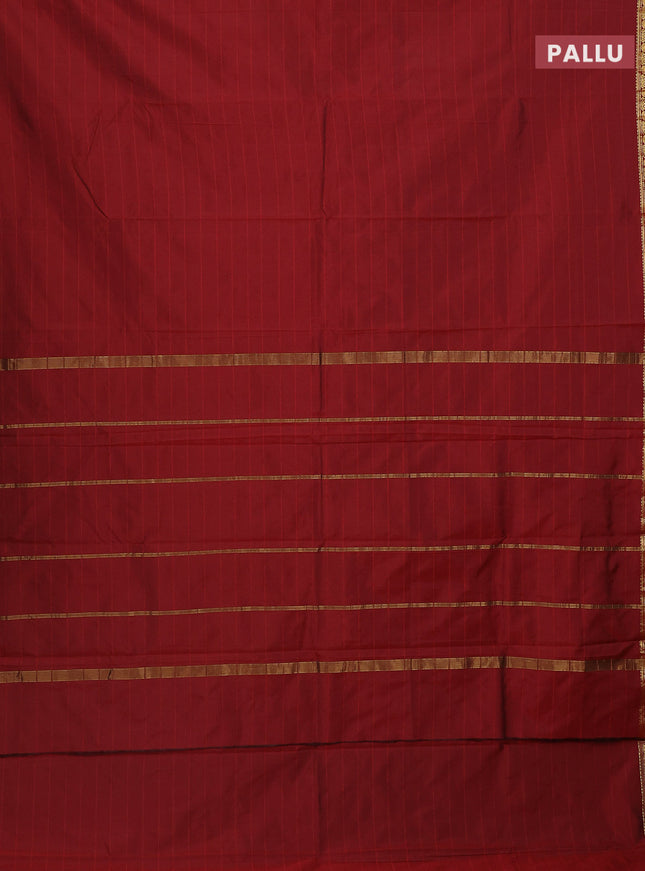 Arani semi silk saree maroon with plain body and zari woven border