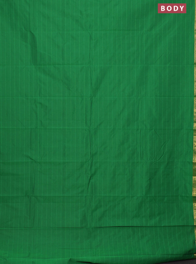 Arani semi silk saree green with plain body and zari woven border