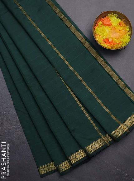 Arani semi silk saree bottle green with plain body and zari woven border