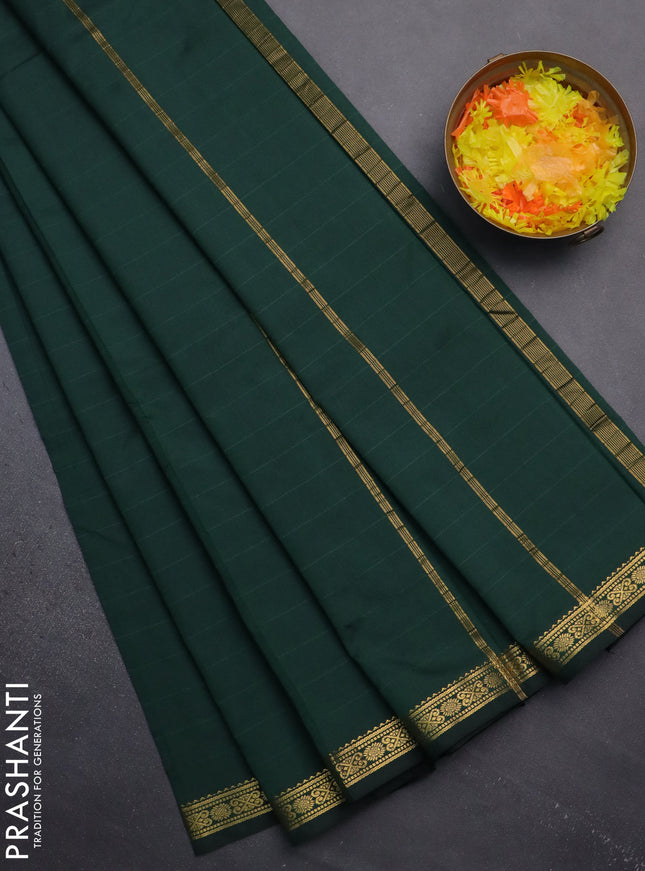 Arani semi silk saree bottle green with plain body and zari woven border