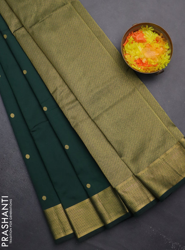 Arani semi silk saree bottle green with zari woven buttas and zari woven border