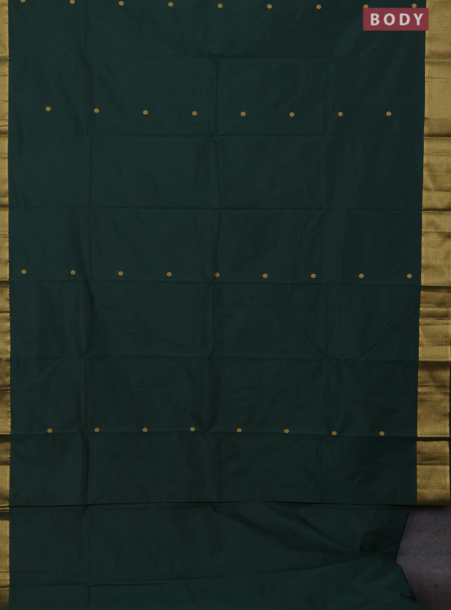 Arani semi silk saree bottle green with zari woven buttas and zari woven border