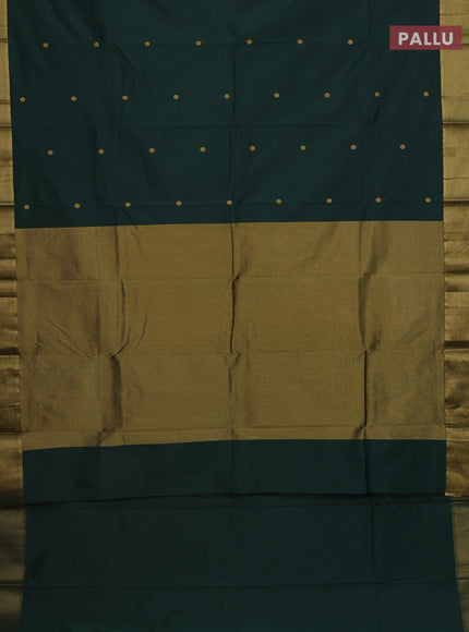 Arani semi silk saree bottle green with zari woven buttas and zari woven border
