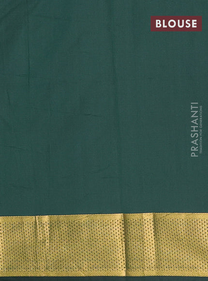 Arani semi silk saree bottle green with zari woven buttas and zari woven border