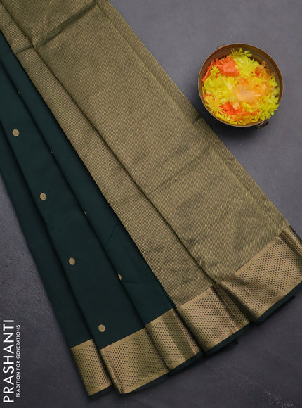 Arani semi silk saree bottle green with zari woven buttas and zari woven border
