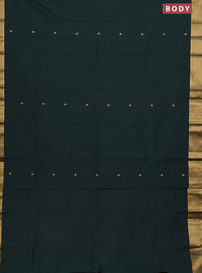 Arani semi silk saree bottle green with zari woven buttas and zari woven border