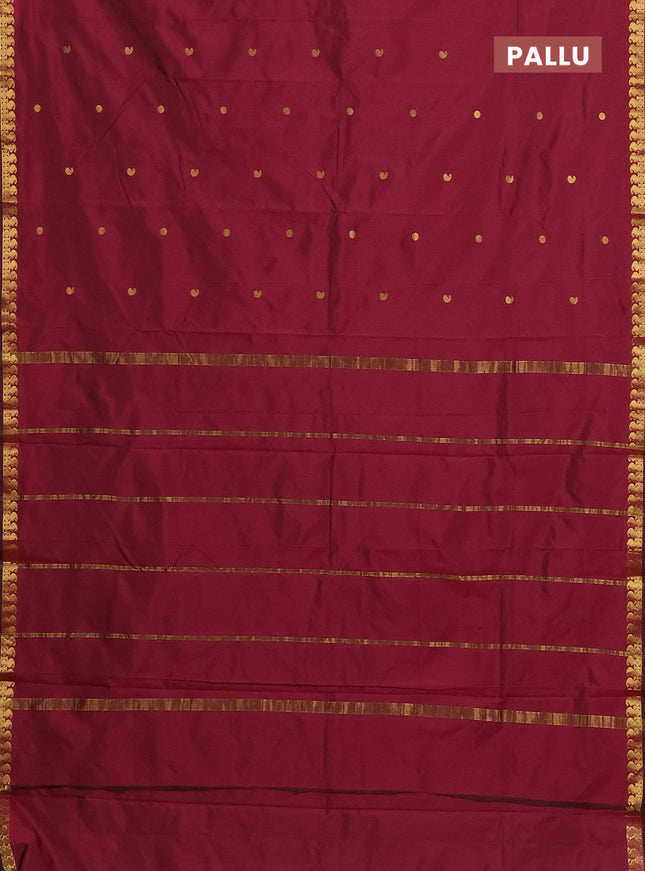 Arani semi silk saree maroon shade with rudhraksha & paisley zari woven buttas and zari woven border