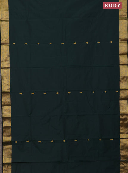 Arani semi silk saree bottle green with zari woven thilak buttas and zari woven border