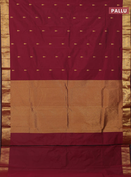 Arani semi silk saree maroon shade with zari woven thilak buttas and zari woven border