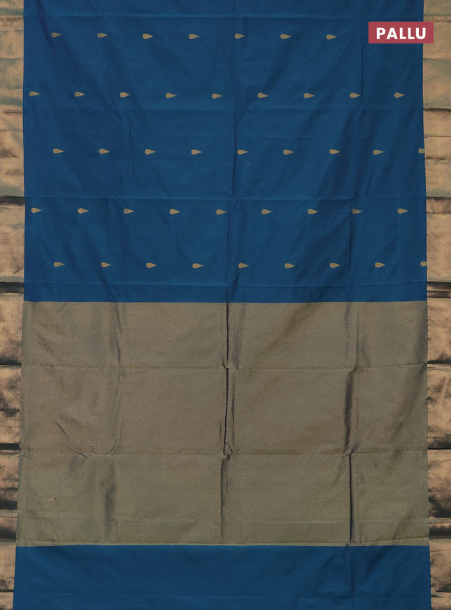 Arani semi silk saree dual shade of teal green with zari woven thilak buttas and zari woven border