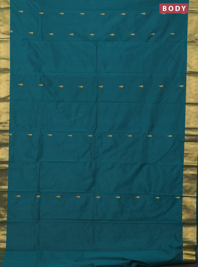 Arani semi silk saree peacock green with zari woven thilak buttas and zari woven border