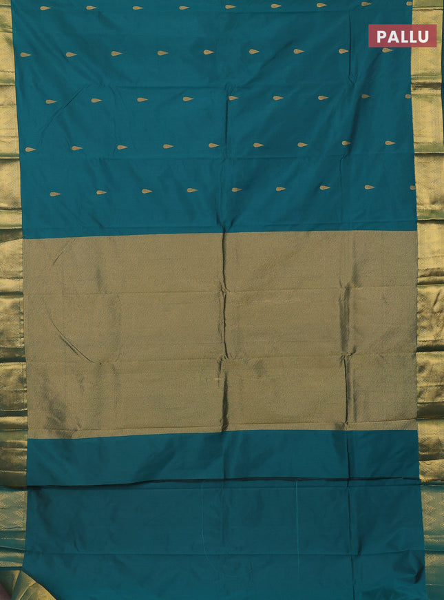 Arani semi silk saree peacock green with zari woven thilak buttas and zari woven border