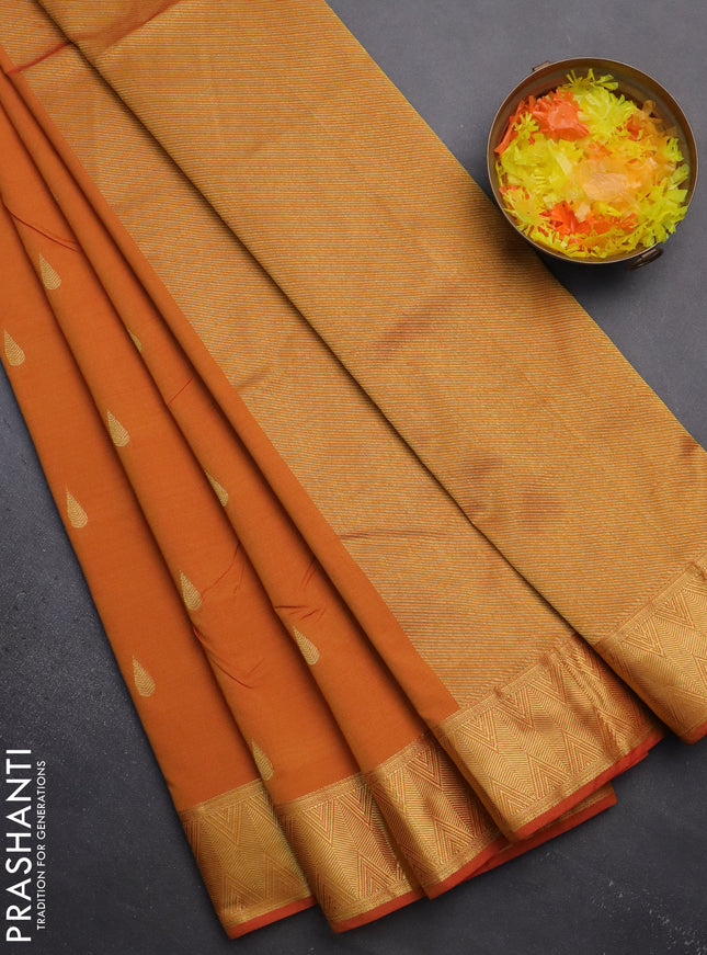 Arani semi silk saree dual shade of dark mustard with zari woven thilak buttas and zari woven border