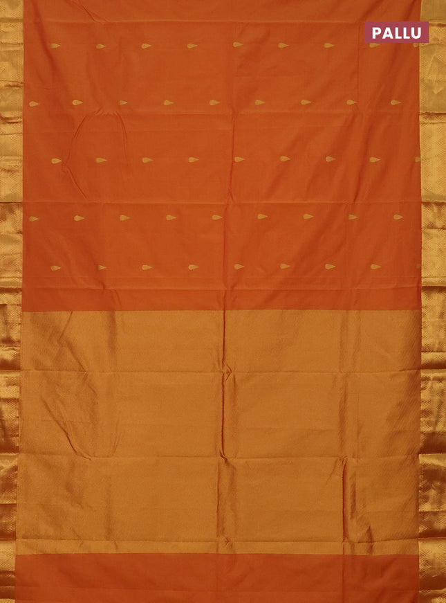 Arani semi silk saree dual shade of dark mustard with zari woven thilak buttas and zari woven border