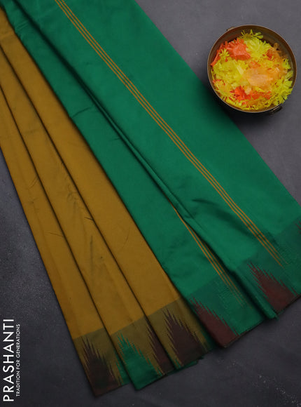 Arani semi silk saree dark mustard and dual shade of green with plain body and temple design border