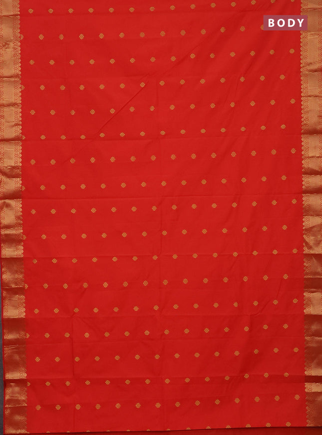 Arani semi silk saree orange with zari woven floral buttas and zari woven border