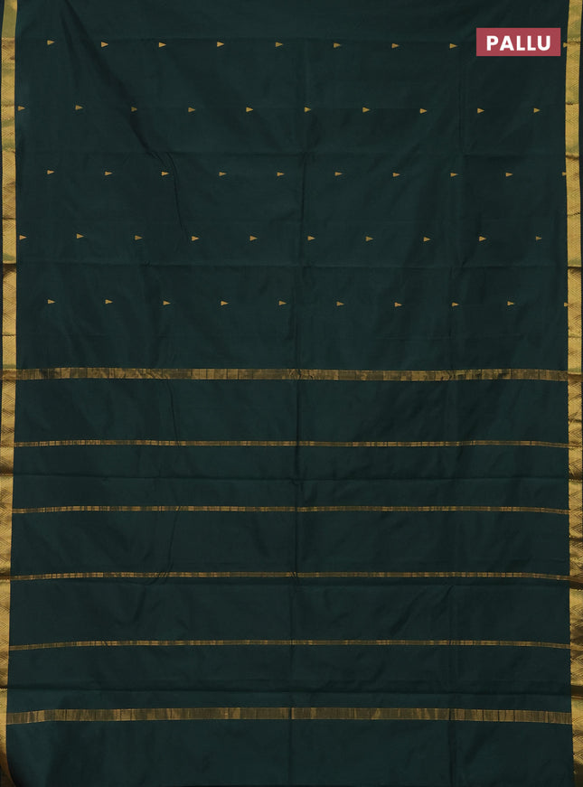 Arani semi silk saree bottle green with zari woven temple buttas and zari woven border