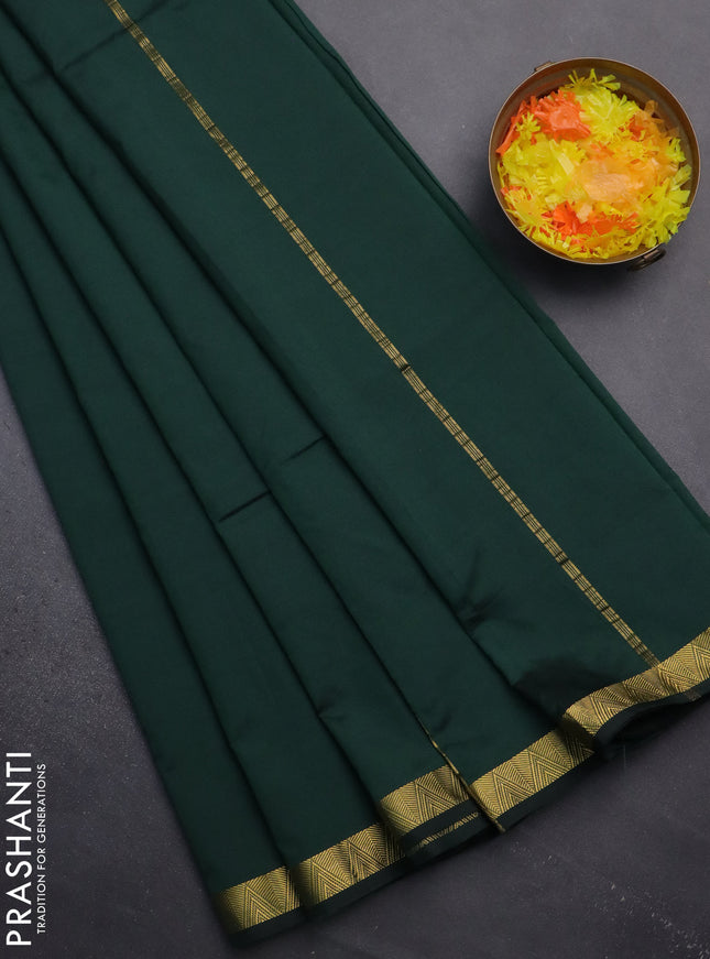 Arani semi silk saree bottle green with plain body and zari woven border
