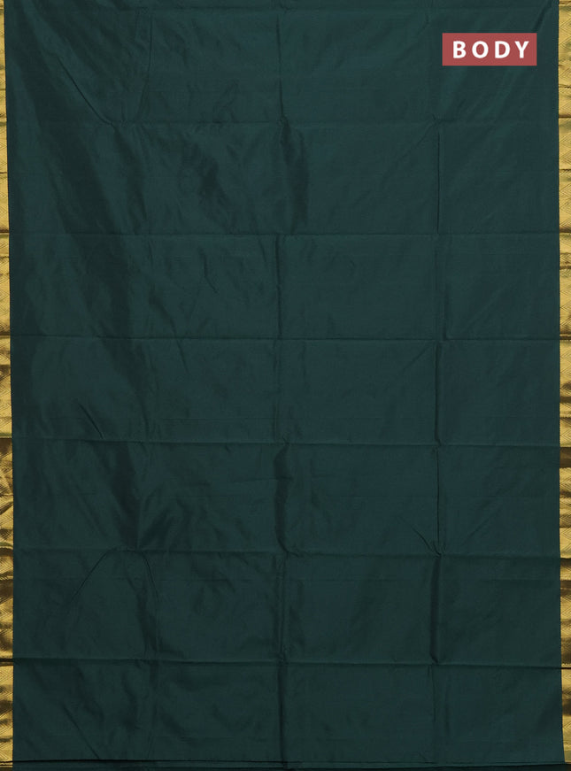 Arani semi silk saree bottle green with plain body and zari woven border