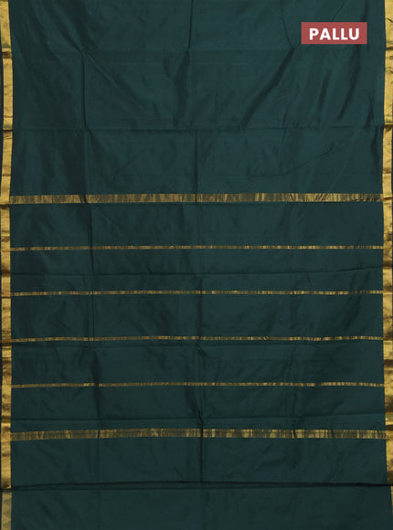 Arani semi silk saree bottle green with plain body and zari woven border