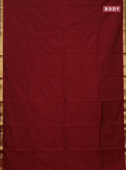 Arani semi silk saree maroon with plain body and zari woven border