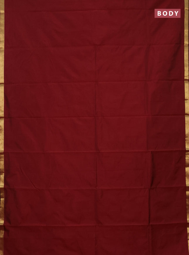 Arani semi silk saree maroon with plain body and zari woven border