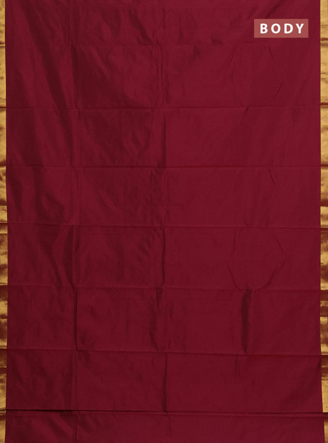Arani semi silk saree wine shade with plain body and zari woven border