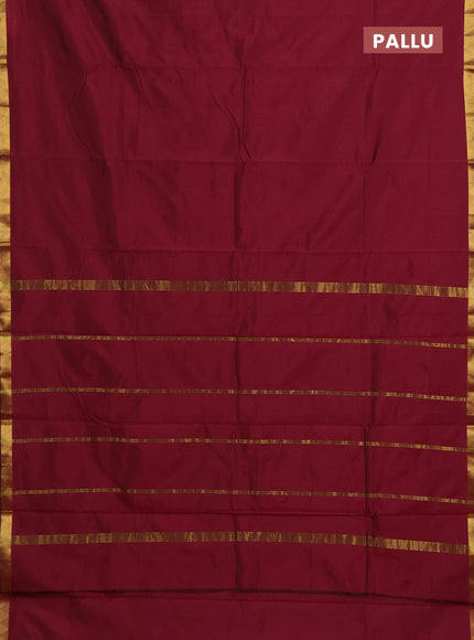 Arani semi silk saree wine shade with plain body and zari woven border