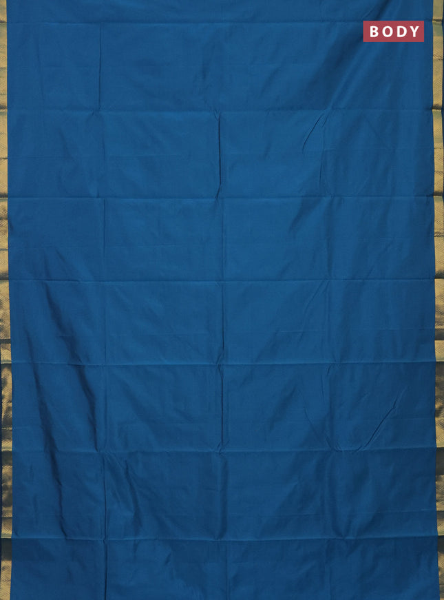 Arani semi silk saree peacock blue with plain body and zari woven border