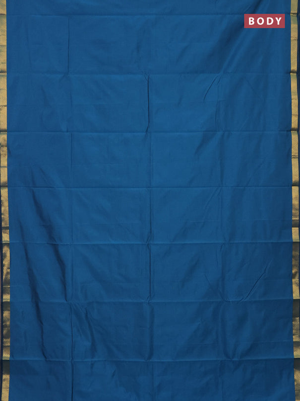 Arani semi silk saree peacock blue with plain body and zari woven border