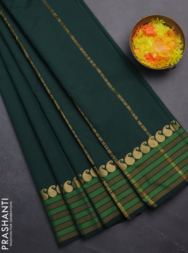 Arani semi silk saree bottle green and mustard yellow with plain body and paisley zari woven simple border