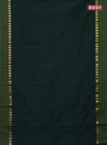 Arani semi silk saree bottle green and mustard yellow with plain body and paisley zari woven simple border