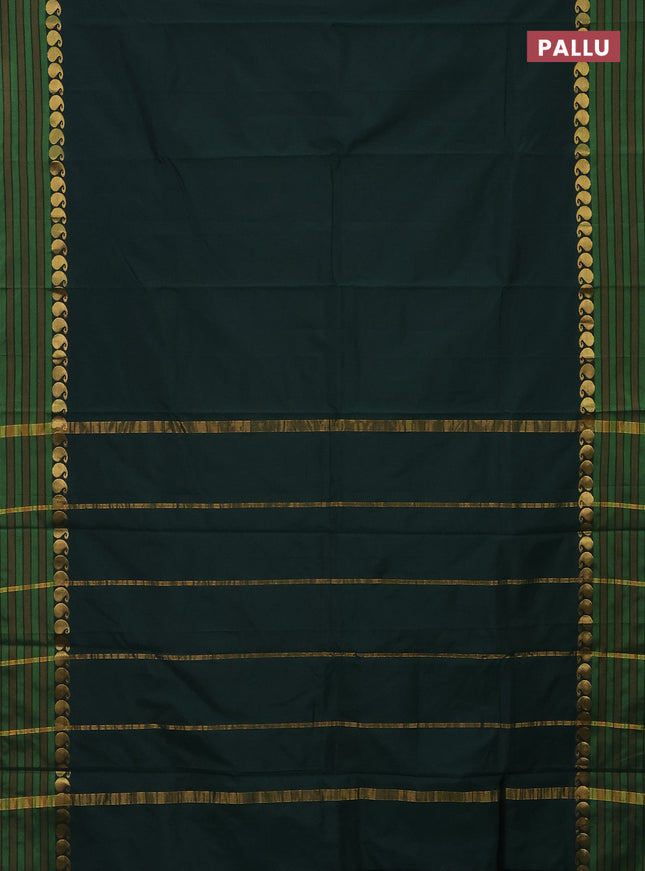 Arani semi silk saree bottle green and mustard yellow with plain body and paisley zari woven simple border