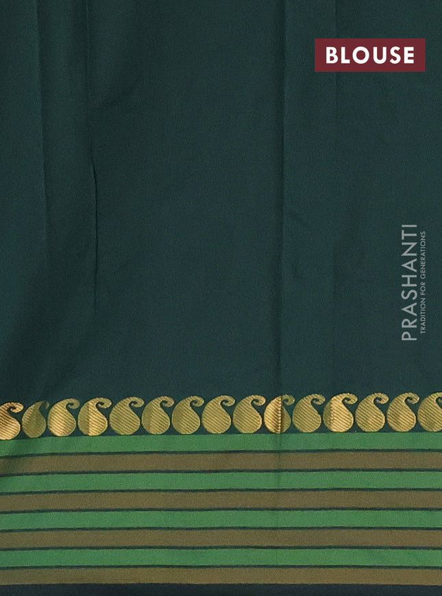 Arani semi silk saree bottle green and mustard yellow with plain body and paisley zari woven simple border
