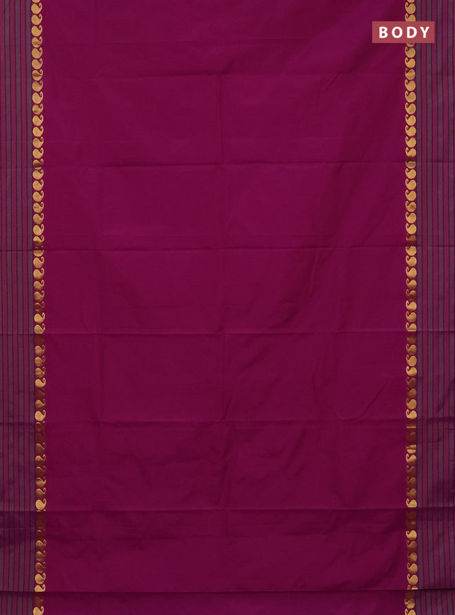 Arani semi silk saree dual shade of purple and green shade with plain body and paisley zari woven simple border