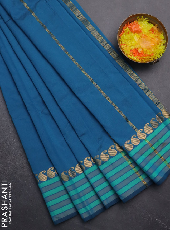 Arani semi silk saree peacock blue and teal green with plain body and paisley zari woven simple border