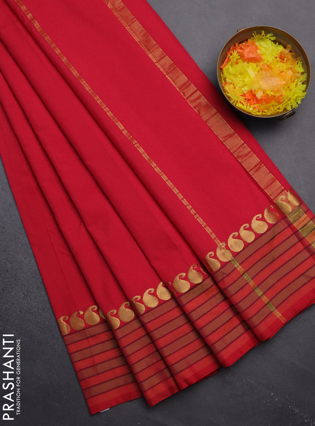 Arani semi silk saree red and light green with plain body and paisley zari woven simple border