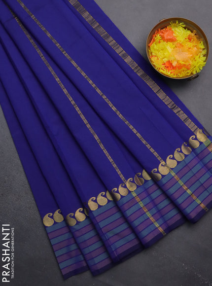Arani semi silk saree blue and green shade with plain body and paisley zari woven simple border