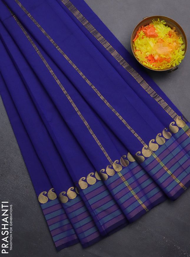 Arani semi silk saree blue and green shade with plain body and paisley zari woven simple border
