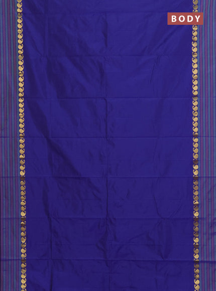 Arani semi silk saree blue and green shade with plain body and paisley zari woven simple border