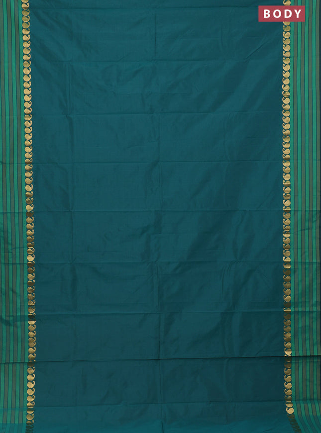 Arani semi silk saree peacock green and green with plain body and paisley zari woven simple border