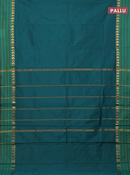 Arani semi silk saree peacock green and green with plain body and paisley zari woven simple border