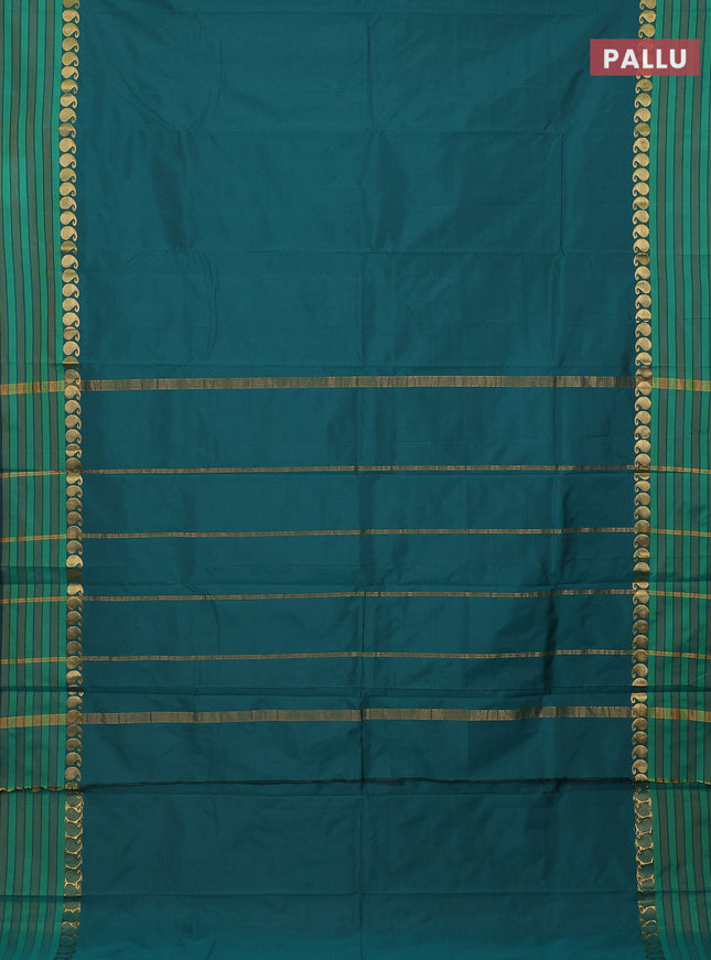 Arani semi silk saree peacock green and green with plain body and paisley zari woven simple border