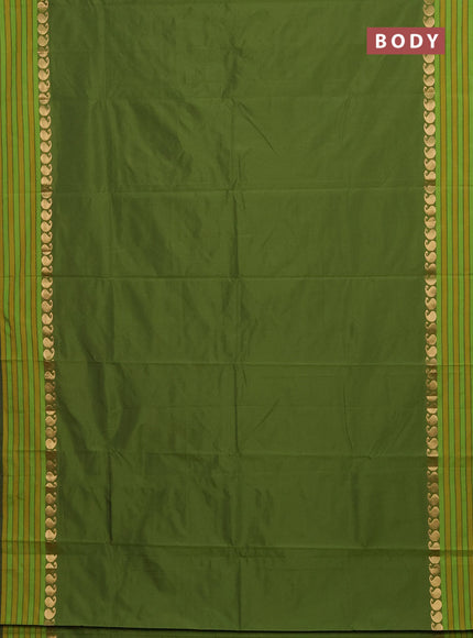 Arani semi silk saree sap green and mustard yellow with plain body and paisley zari woven simple border